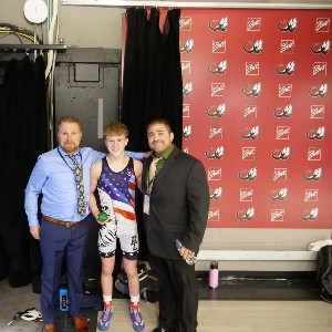 Griffin Rial with his dad (left) and Coach Billy Gabel